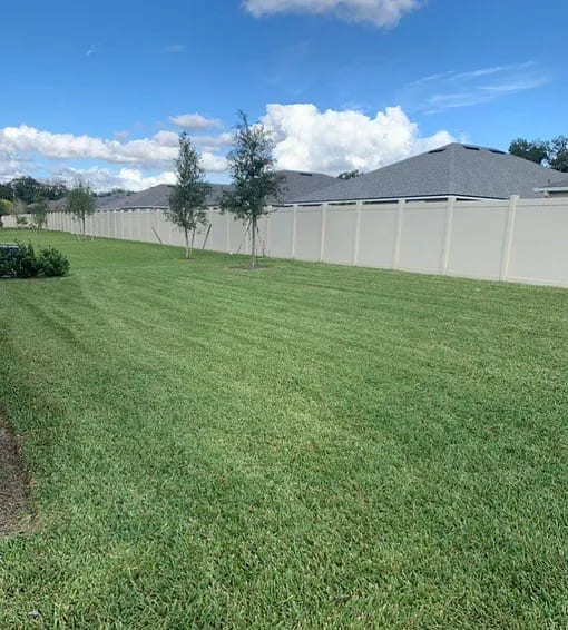 All Trusted Lawn Care team caring for a lawn in Valrico, FL